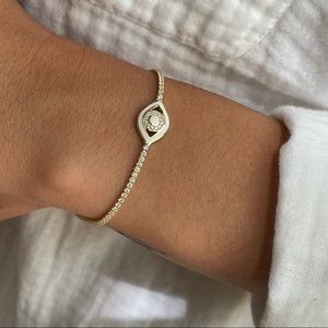 Gold evil eye tennis bracelet
